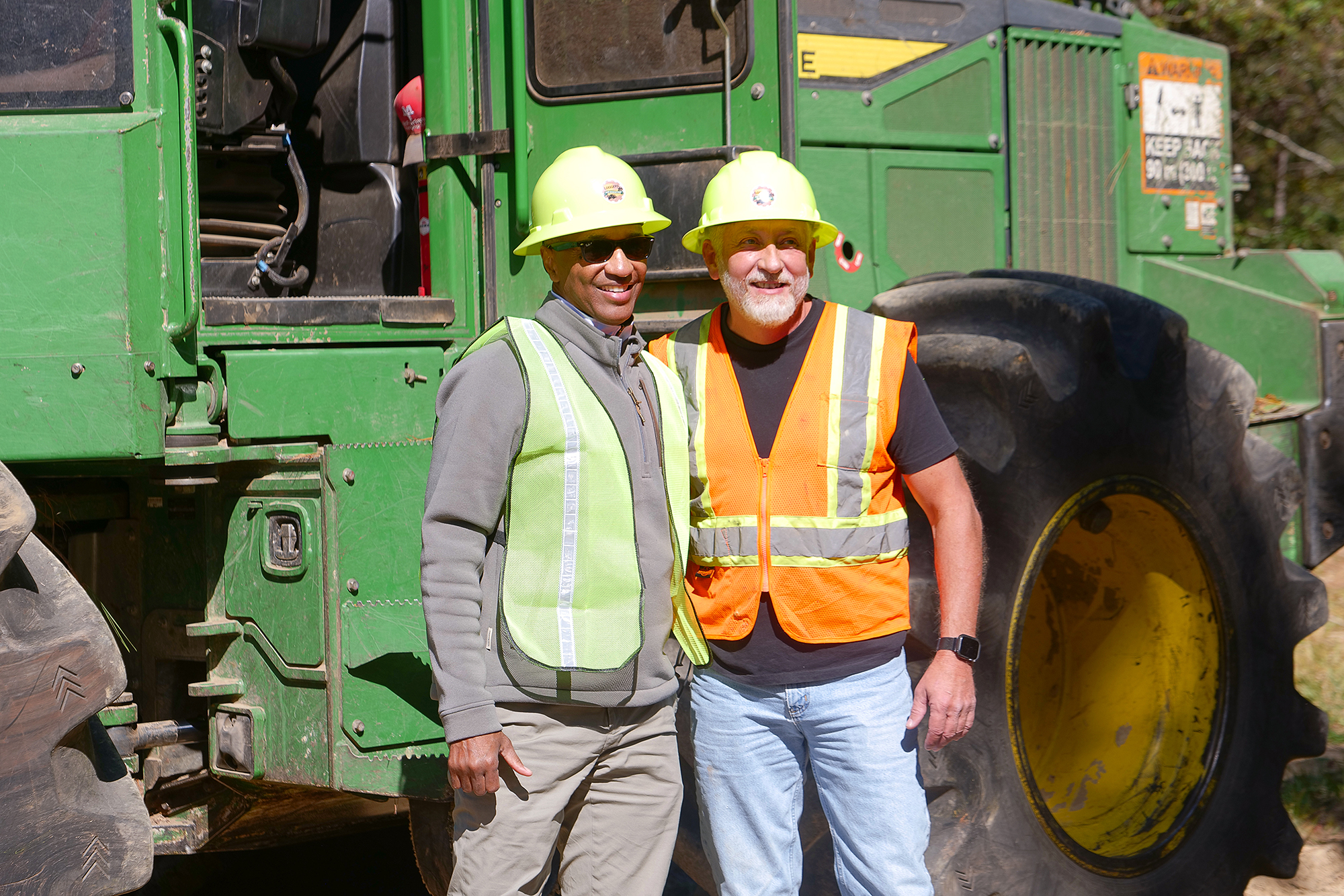 President Tate and Rep. Jack McFarland at logging facility