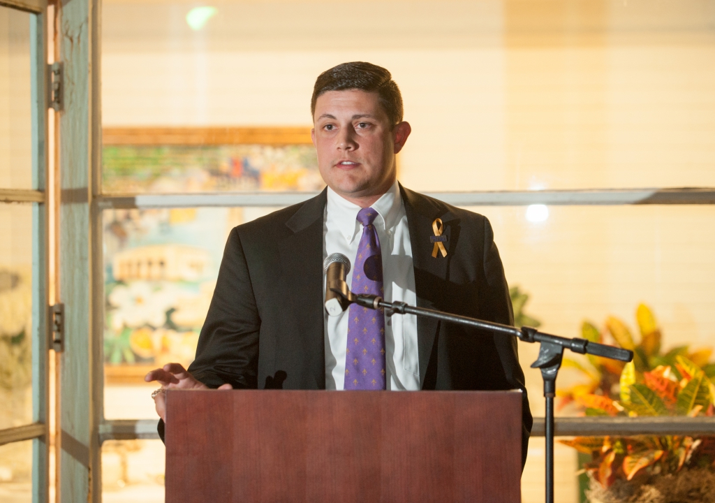 Scheuermann speaking at banquet