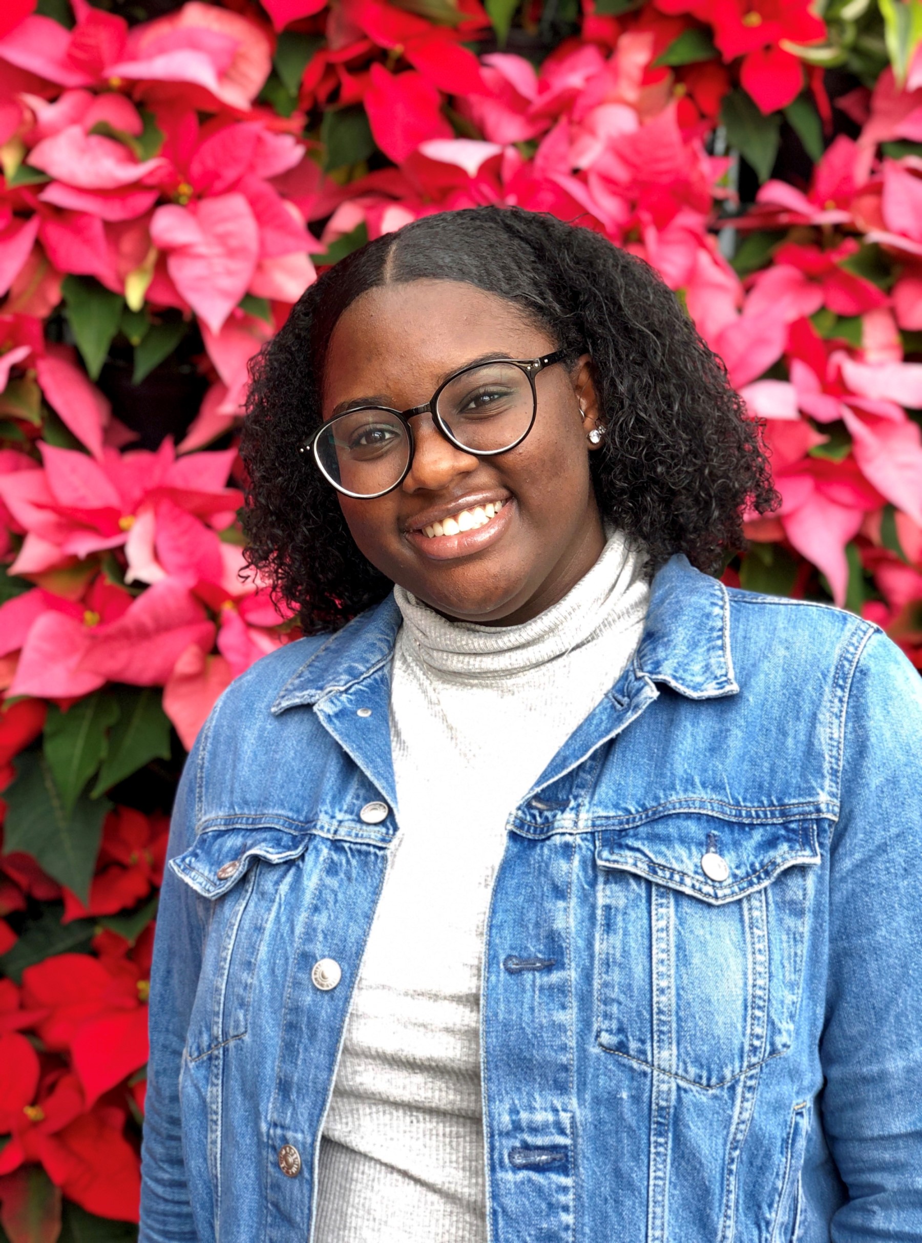 Photo of Layah Khalif with pink flowers background