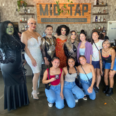 Group photo at drag musical brunch